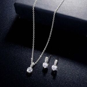 Elegant Silver Jewelry Set with Heart Pendants